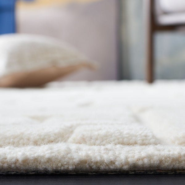 Safavieh Manhattan 575 Hand Tufted Contemporary Rug Ivory 8' x 10'