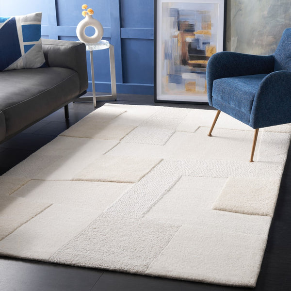 Safavieh Manhattan 576 Hand Tufted Contemporary Rug Ivory / Beige 5' x 8'