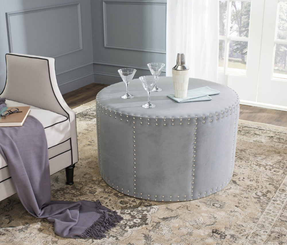 Safavieh Jody Round Ottoman In Soft Grey Velour With Silver Nailhead Trim - Stylish, Versatile Seating Solution MCR4640F