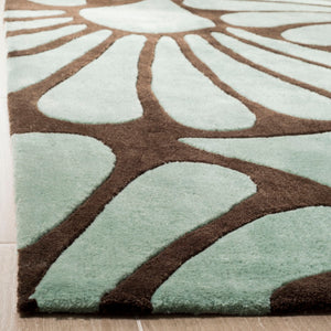 Safavieh Modern Art Area Rug - Hand-tufted Polyester Elegance With Floral Motifs For Cozy Home Décor Brown ,Blue Polyester Mda613a-7r