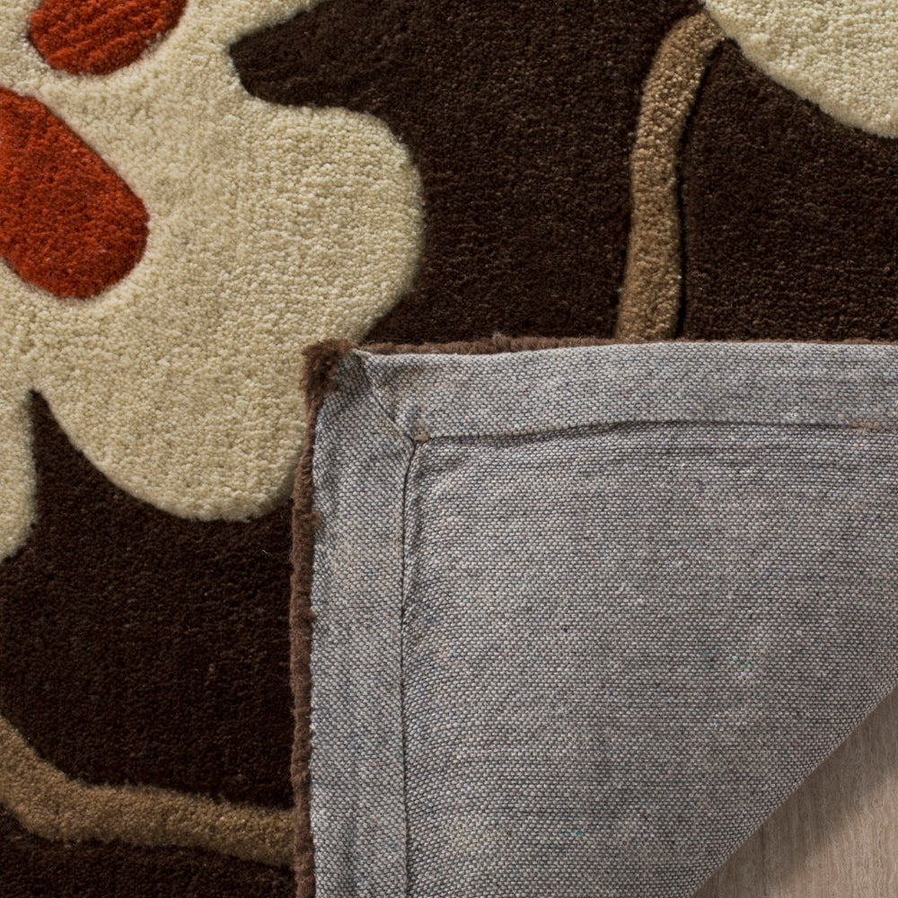 Safavieh Modern Hand-tufted Polyester Area Rug - Exquisite Floral Design For Elegant Home Décor And Comfort Brown ,Ivory Polyester Mda614a-8