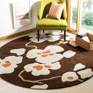 Safavieh Modern Hand-tufted Polyester Area Rug - Exquisite Floral Design For Elegant Home Décor And Comfort Brown ,Ivory Polyester Mda614a-8