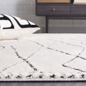 Safavieh Melody Elegant Area Rug - Luxurious Softness, Durable Design, Bohemian Charm For Timeless Spaces Ivory ,Black Polyester Mel112b-10