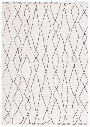 Safavieh Melody Elegant Area Rug - Luxurious Softness, Durable Design, Bohemian Charm For Timeless Spaces Ivory ,Black Polyester Mel112b-10