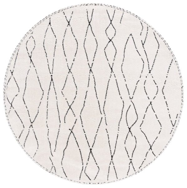 Safavieh Melody Elegant Area Rug - Luxurious Softness, Durable Design, Bohemian Charm For Timeless Spaces Ivory ,Black Polyester Mel112b-10