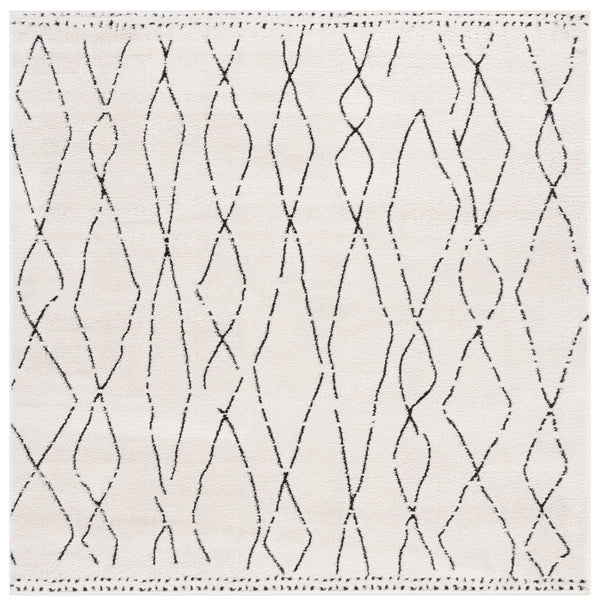Safavieh Melody Elegant Area Rug - Luxurious Softness, Durable Design, Bohemian Charm For Timeless Spaces Ivory ,Black Polyester Mel112b-10