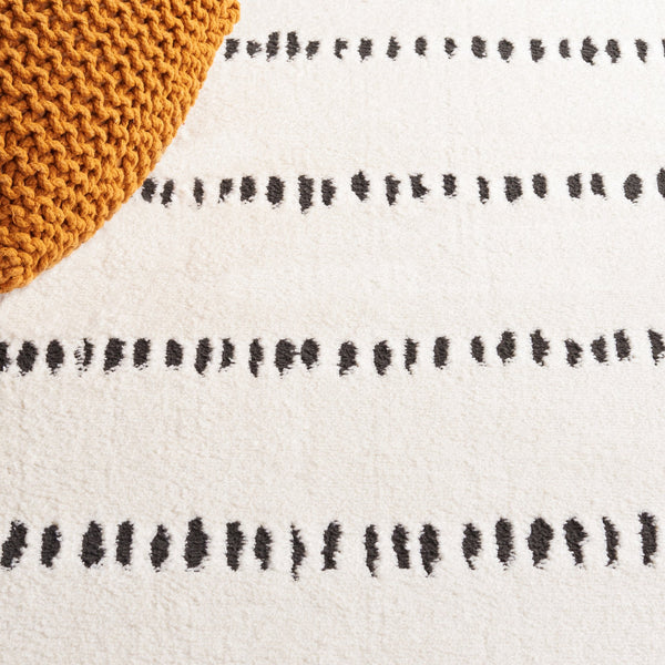 Safavieh Melody Modern Power-loomed Rug - Chic Ivory And Black Design For Stylish Home Décor And Comfort Ivory ,Black Polyester Mel114a-210