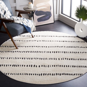 Safavieh Melody Modern Power-loomed Rug - Chic Ivory And Black Design For Stylish Home Décor And Comfort Ivory ,Black Polyester Mel114a-210