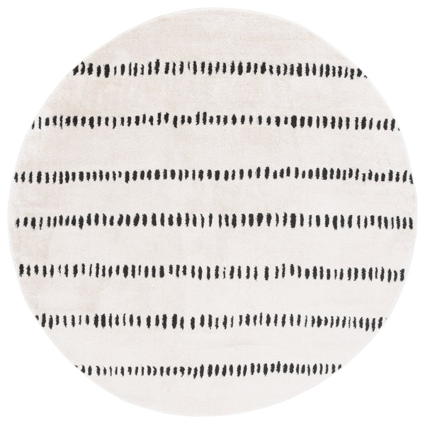 Safavieh Melody Modern Power-loomed Rug - Chic Ivory And Black Design For Stylish Home Décor And Comfort Ivory ,Black Polyester Mel114a-210