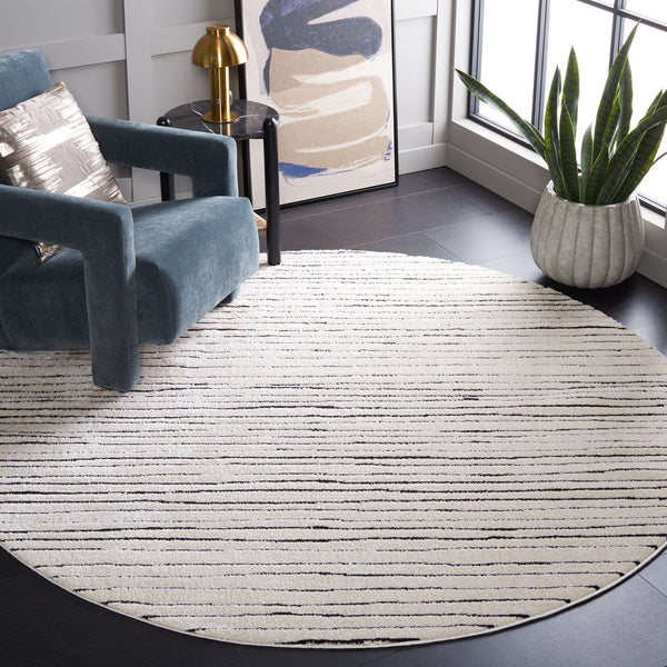 Safavieh Melody Modern Abstract Area Rug - Luxurious Polyester Design For Elegant Home Décor And Style Ivory ,Black Polyester Mel118a-10