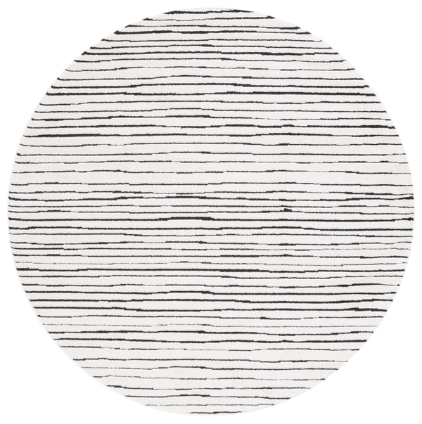 Safavieh Melody Modern Abstract Area Rug - Luxurious Polyester Design For Elegant Home Décor And Style Ivory ,Black Polyester Mel118a-10