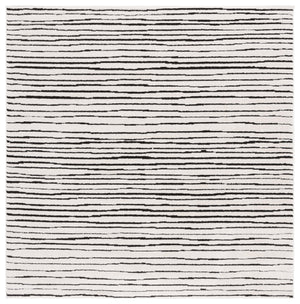 Safavieh Melody Modern Abstract Area Rug - Luxurious Polyester Design For Elegant Home Décor And Style Ivory ,Black Polyester Mel118a-10