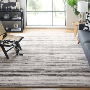Safavieh Melody Modern Abstract Area Rug - Luxurious Polyester Design For Elegant Home Décor And Style Ivory ,Black Polyester Mel118a-10