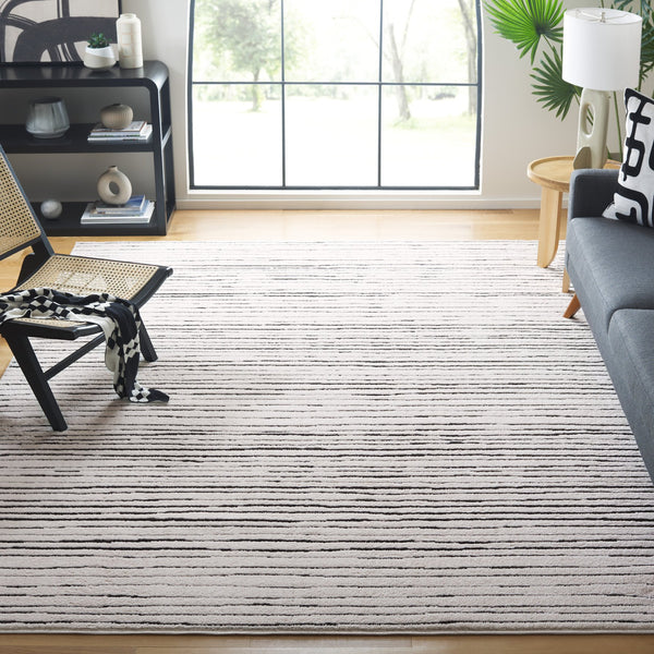 Safavieh Melody Modern Abstract Area Rug - Luxurious Polyester Design For Elegant Home Décor And Style Ivory ,Black Polyester Mel118a-10