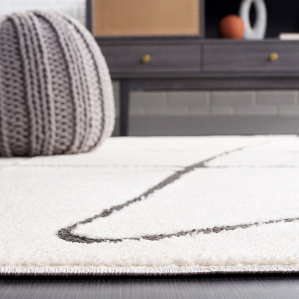 Safavieh Melody Modern Area Rug - Elegant Abstract Design In Minimalist Black & Ivory For Chic Home Decor Ivory ,Black Polyester Mel120a-4r