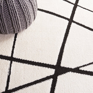 Safavieh Melody Modern Area Rug - Elegant Abstract Design In Minimalist Black & Ivory For Chic Home Decor Ivory ,Black Polyester Mel120a-4r