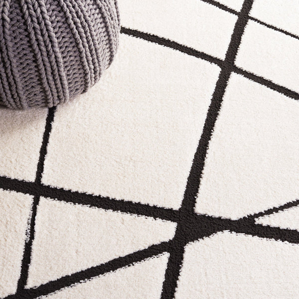 Safavieh Melody Modern Area Rug - Elegant Abstract Design In Minimalist Black & Ivory For Chic Home Decor Ivory ,Black Polyester Mel120a-4r