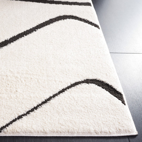 Safavieh Melody Area Rug - Stylish Power Loomed Design For Modern Living, Elegant Texture & Global Craftsmanship Ivory ,Black Performance Fabric Mel120a-68