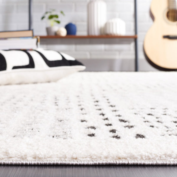 Safavieh Melody Scandinavian-inspired Modern Rug - Elegant Polyester Design For A Cozy Living Space Ivory ,Black Polyester Mel132a-24