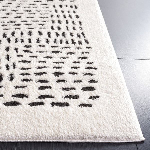 Safavieh Melody Scandinavian-inspired Modern Rug - Elegant Polyester Design For A Cozy Living Space Ivory ,Black Polyester Mel132a-24