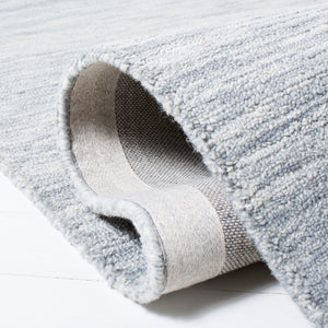 Safavieh Metro Hand-tufted Luxurious Area Rug - Sophisticated Wool And Cotton Blend For Contemporary Spaces Light Grey 80% Wool And 20% Cotton Met152g-6