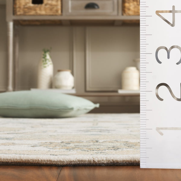 Safavieh Metro Traditional Hand-tufted Wool Area Rug - Elegant Ivory And Beige Floral Design For Any Space Ivory ,Beige Wool Pile Met827a-4