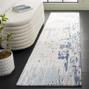 Safavieh Metro Hand-tufted Area Rug: Luxurious Wool Blend With Abstract Design For Stylish Home Décor Ivory ,Blue 85% Wool,15% Cotton Met854m-6sq