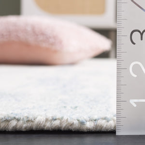 Safavieh Metro Hand-tufted Area Rug: Luxurious Wool Blend With Abstract Design For Stylish Home Décor Ivory ,Blue 85% Wool,15% Cotton Met854m-6sq