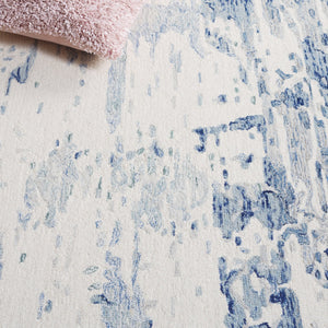 Safavieh Metro Hand-tufted Area Rug: Luxurious Wool Blend With Abstract Design For Stylish Home Décor Ivory ,Blue 85% Wool,15% Cotton Met854m-6sq