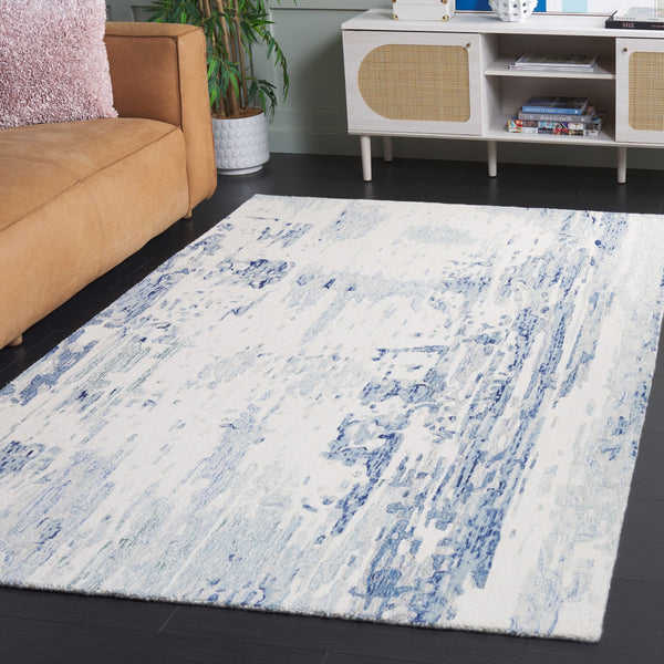 Safavieh Metro Hand-tufted Area Rug: Luxurious Wool Blend With Abstract Design For Stylish Home Décor Ivory ,Blue 85% Wool,15% Cotton Met854m-6sq