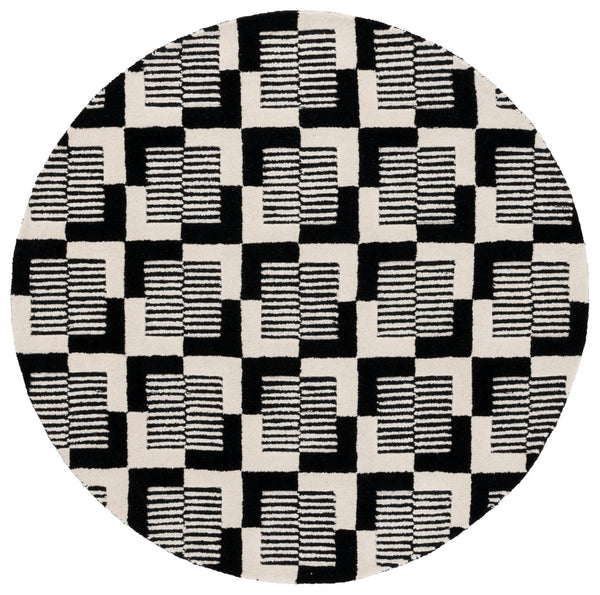 Safavieh Metro Hand-tufted Area Rug - Elegant Geometric Design In Black And Ivory For Modern Living Spaces Black ,Ivory 85% Wool,15% Cotton Met869z-3