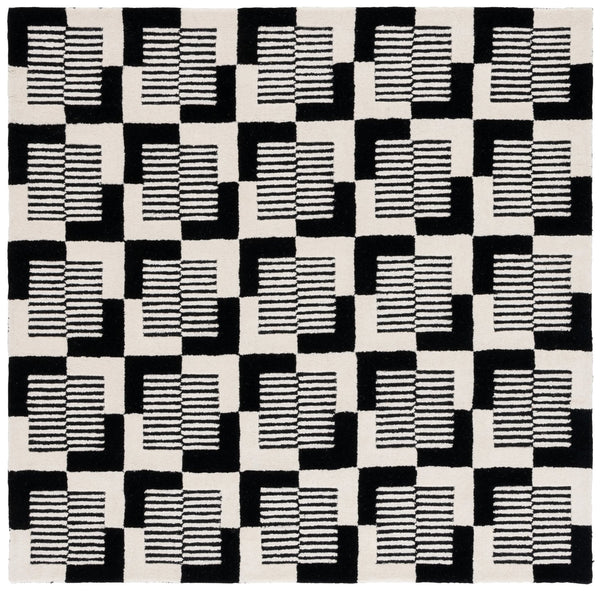 Safavieh Metro Hand-tufted Area Rug - Elegant Geometric Design In Black And Ivory For Modern Living Spaces Black ,Ivory 85% Wool,15% Cotton Met869z-3