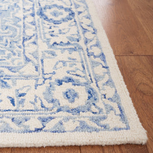 Safavieh Metro Hand-tufted Area Rug - Luxurious Wool And Cotton Blend With Timeless Elegance For Any Space Blue ,Ivory 80% Wool And 20% Cotton Met874m-213