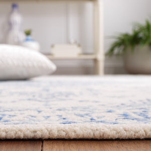 Safavieh Metro Hand-tufted Area Rug - Luxurious Wool And Cotton Blend With Timeless Elegance For Any Space Blue ,Ivory 80% Wool And 20% Cotton Met874m-213