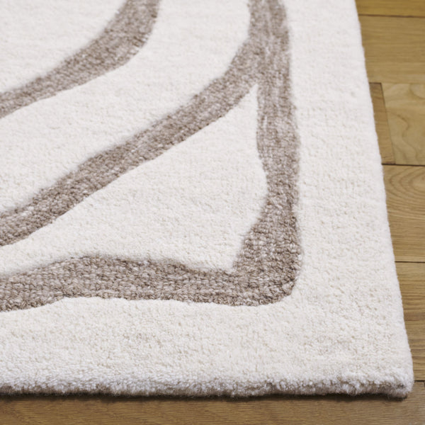 Safavieh Metro Hand-tufted Area Rug - Elegant Modern Design For A Sophisticated Contemporary Home Decor Ivory ,Grey 80% Wool,20% Cotton Met951a-5