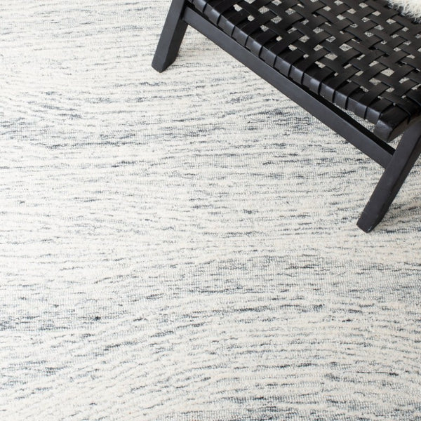 Safavieh Metro Hand Tufted Wool Cotton Area Rug Solid Neutral Pile for Modern Living Rooms MET995H-10
