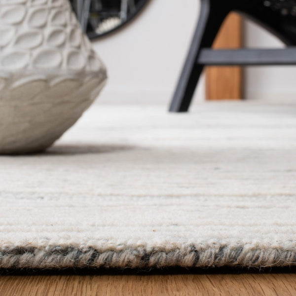Safavieh Metro Hand Tufted Wool Cotton Area Rug Solid Neutral Pile for Modern Living Rooms MET995H-10
