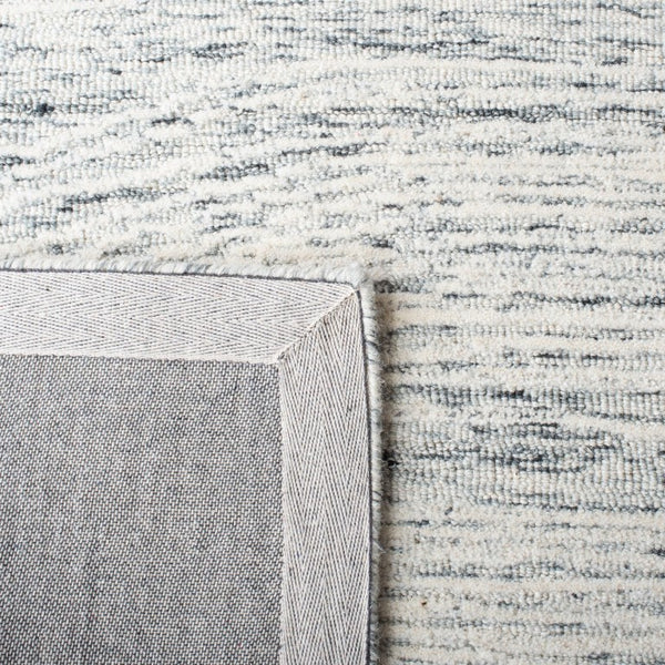 Safavieh Metro Hand Tufted Wool Cotton Area Rug Solid Neutral Pile for Modern Living Rooms MET995H-10