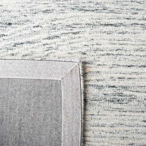 Safavieh Metro 995 Hand Tufted  Rug Dark Grey / Ivory MET995H-9