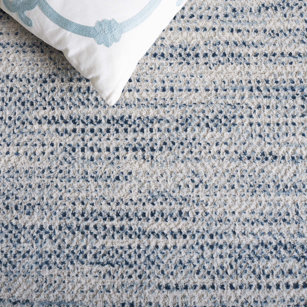 Safavieh Mila Modern Abstract Area Rug - Elegant Blue And Ivory Design For Luxurious Home Decor Comfort Blue ,Ivory Polyester Mil226m-9