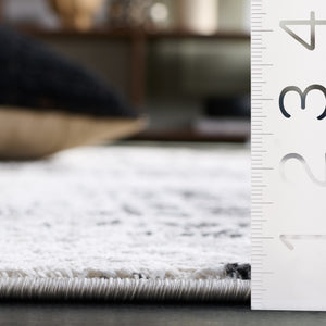 Safavieh Mila Modern Area Rug – Elegant Polyester Design For Contemporary & Classic Interiors, 5/8" Height Black ,Ivory Polyester Mil230z-7sq