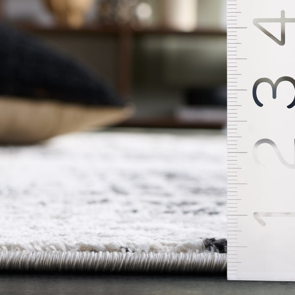 Safavieh Mila Modern Area Rug – Elegant Polyester Design For Contemporary & Classic Interiors, 5/8" Height Black ,Ivory Polyester Mil230z-7sq