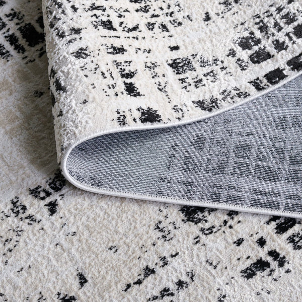 Safavieh Mila Modern Area Rug – Elegant Polyester Design For Contemporary & Classic Interiors, 5/8" Height Black ,Ivory Polyester Mil230z-7sq