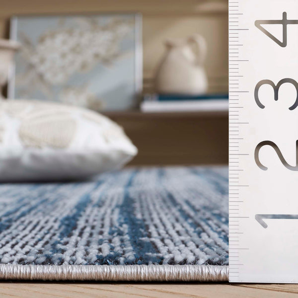 Safavieh Mila Modern Area Rug - Elegant Blue And Ivory Design For Sophisticated Living Spaces At Home Blue ,Ivory Polyester Mil238m-4