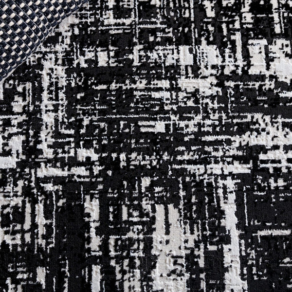 Safavieh Mila Elegant Area Rug - Modern Power Loomed Design For Sophisticated Home Decor And Comfort Ivory ,Black Polyester Mil294a-8