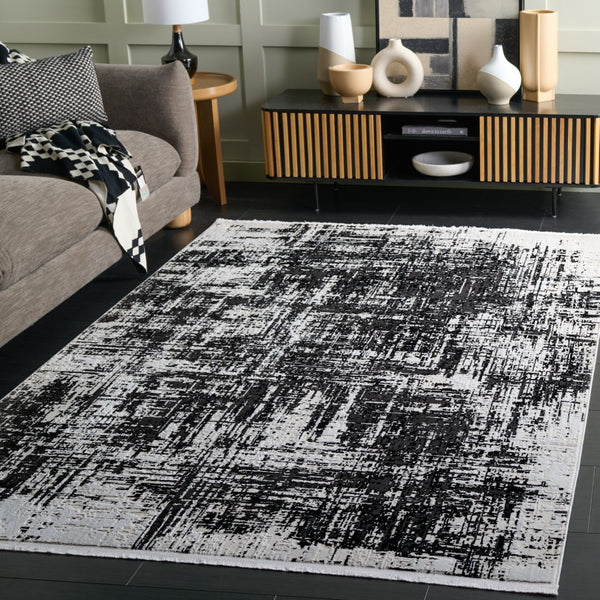 Safavieh Mila Elegant Area Rug - Modern Power Loomed Design For Sophisticated Home Decor And Comfort Ivory ,Black Polyester Mil294a-8