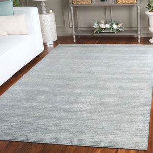 Safavieh Mirage Hand-tufted Area Rug: Luxurious Softness & Contemporary Style For Elegant Home Decor Ivory ,Blue 50% Wool,30% Viscose,20% Cotton Mir375m-6