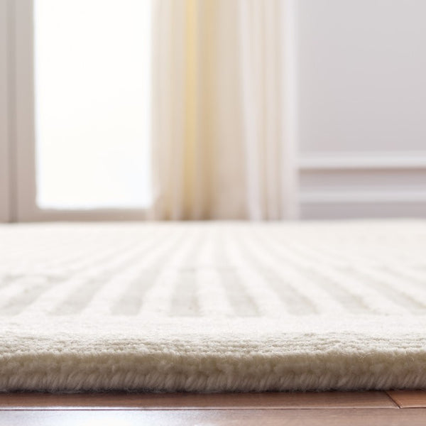 Safavieh Mirage Hand-Loomed Wool Cotton Solid Ivory Area Rug for Modern Living Spaces 9'-0" x 12'-0" MIR634A-9