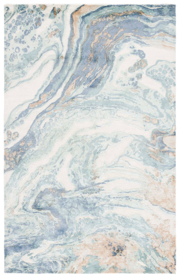 Safavieh Mirage Hand-knotted Area Rug - Luxurious Grey And Ivory Design For Elegant Living Spaces, 6x9 Ft Blue ,Ivory 60% Viscose,30% Wool,& 10% Cotton Mir643m-9