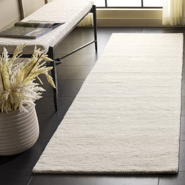 Safavieh Mirage Hand Tufted Ivory Runner Rug Soft Neutral Hallway Accent for Modern Interiors MIR748A-28